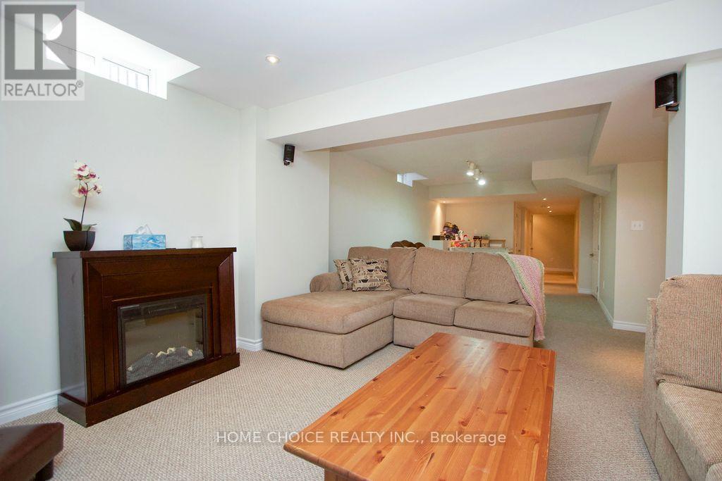 200 Bathgate Crescent, Clarington, ON - Indoor Photo Showing Living Room With Fireplace
