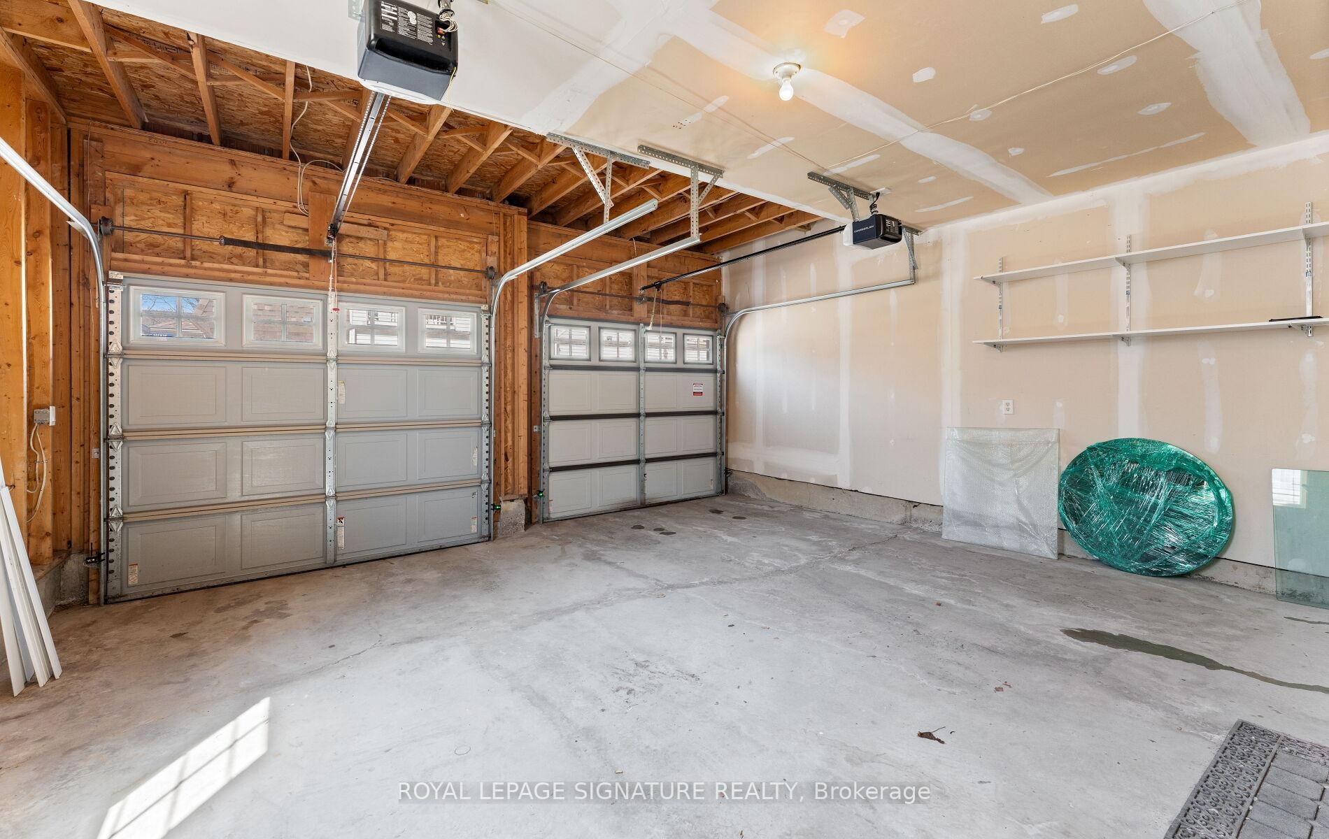23 Yewtree Way, Whitby, ON - Indoor Photo Showing Garage