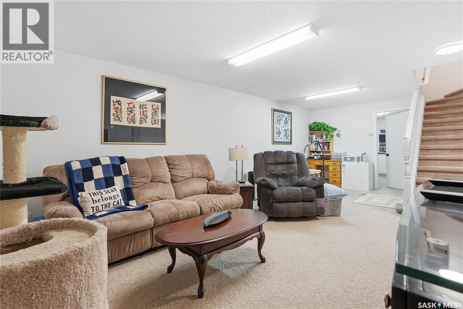 12 80 Berini Drive, Saskatoon, SK - Indoor Photo Showing Living Room