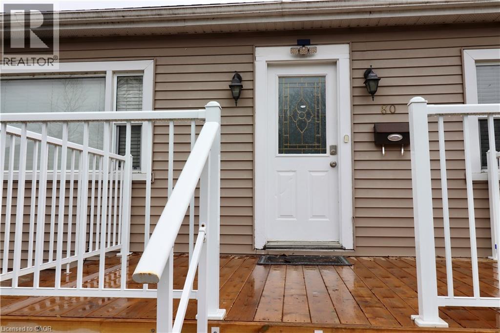 View of exterior entry with a wooden deck - 80 Roseview Avenue, Cambridge, ON - Outdoor