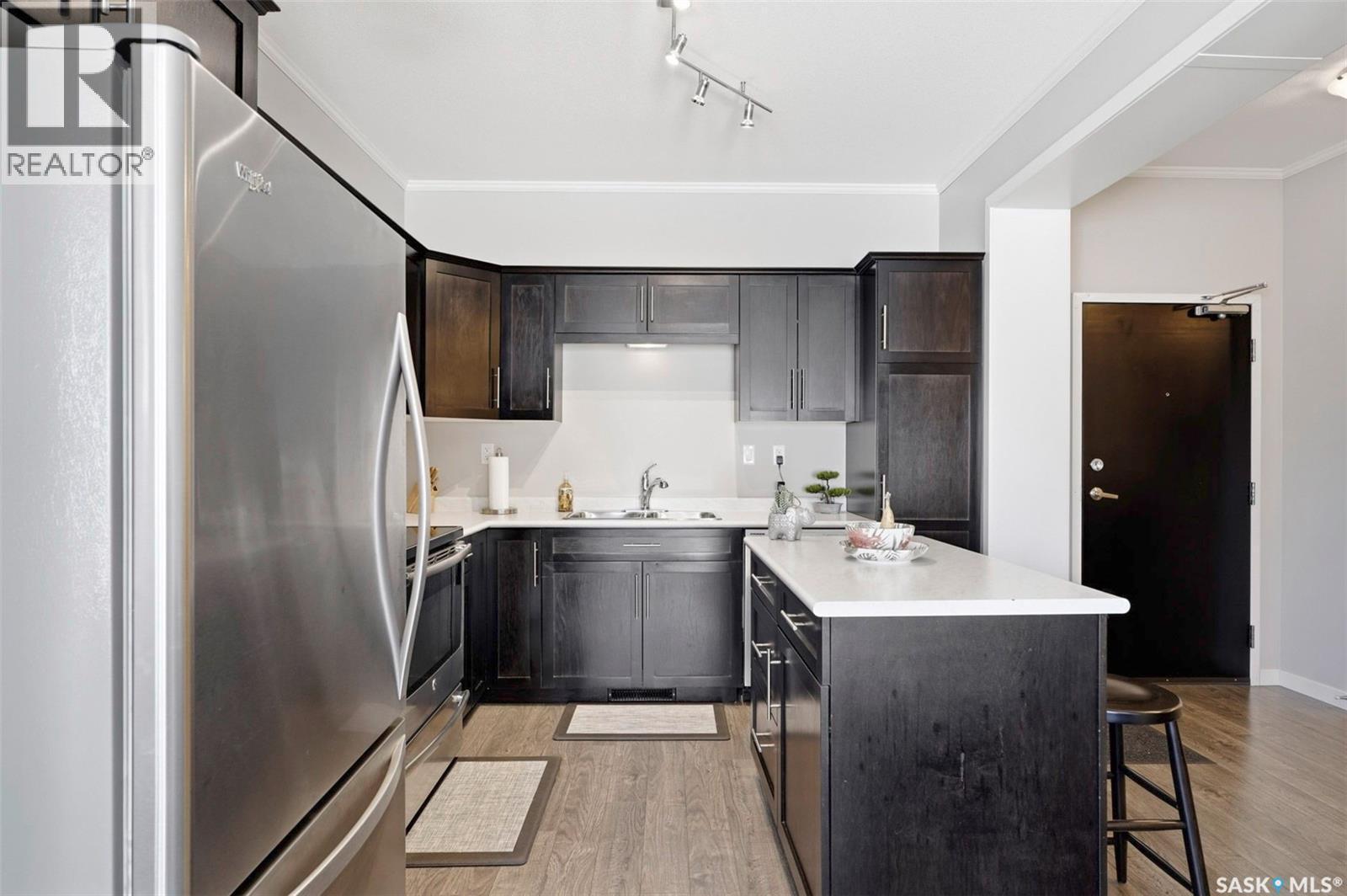 113 545 Hassard Close, Saskatoon, SK - Indoor Photo Showing Kitchen With Stainless Steel Kitchen