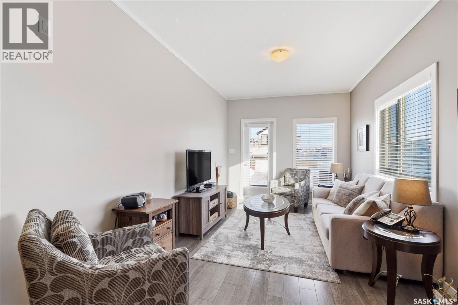 113 545 Hassard Close, Saskatoon, SK - Indoor Photo Showing Living Room