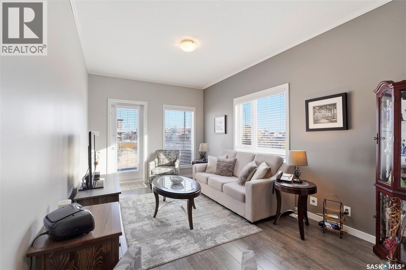 113 545 Hassard Close, Saskatoon, SK - Indoor Photo Showing Living Room