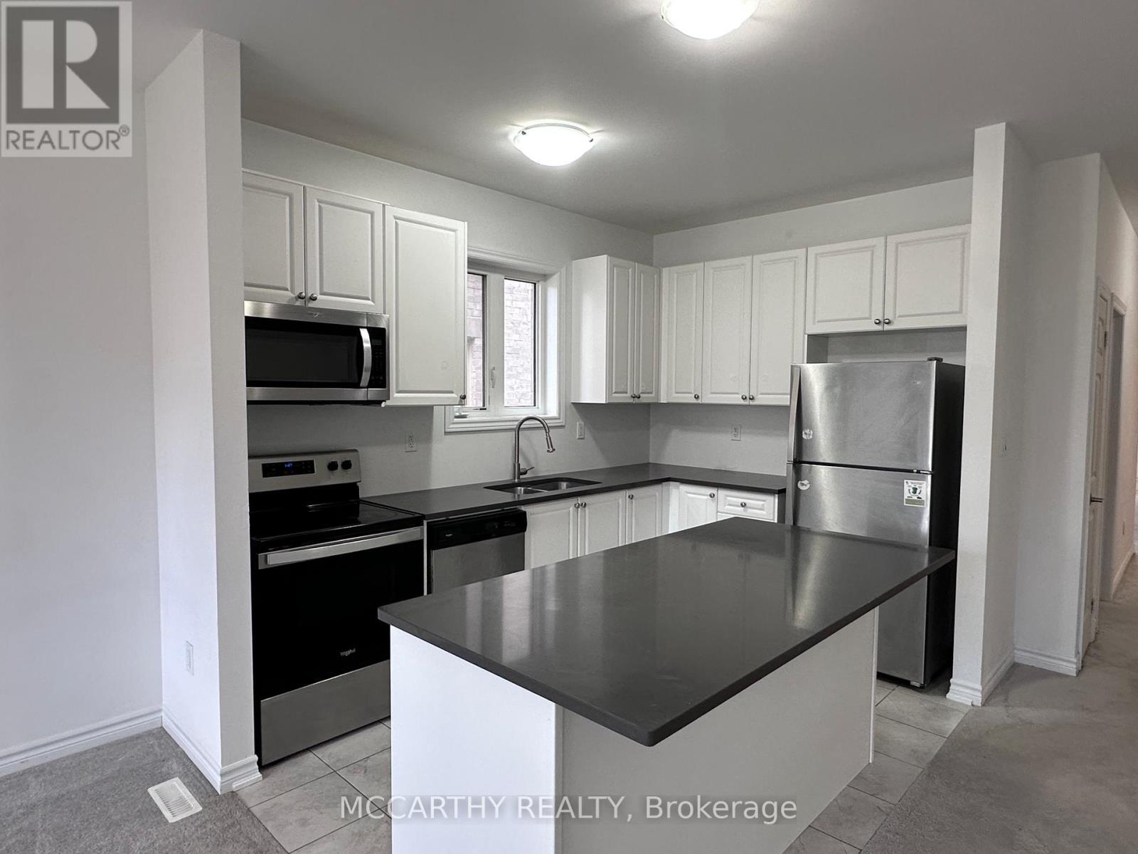 231 Ridley Crescent, Southgate, ON - Indoor Photo Showing Kitchen With Double Sink