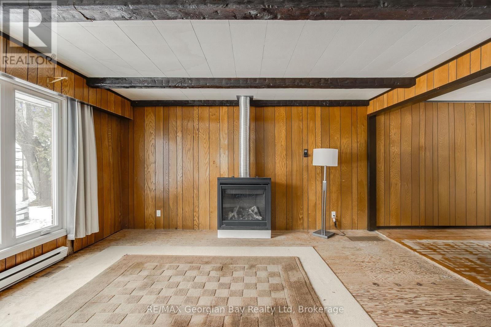 41 Beaufort Crescent, Tiny, ON - Indoor Photo Showing Other Room With Fireplace
