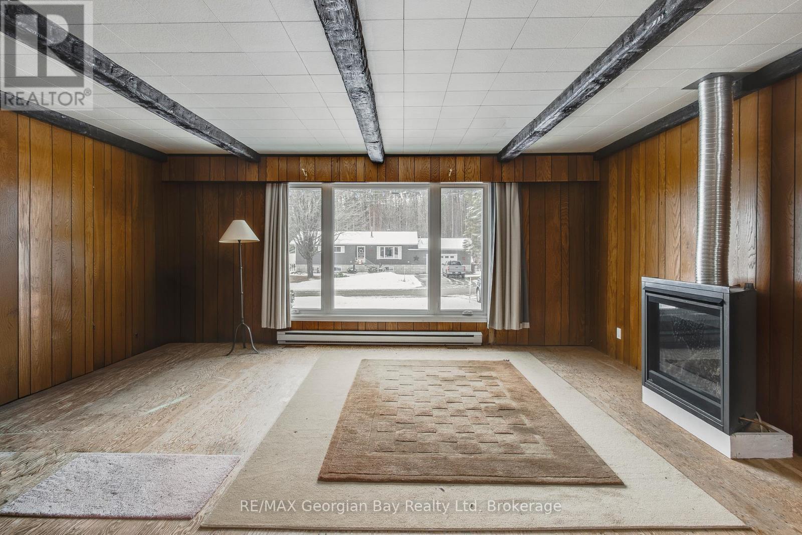 41 Beaufort Crescent, Tiny, ON - Indoor Photo Showing Other Room With Fireplace