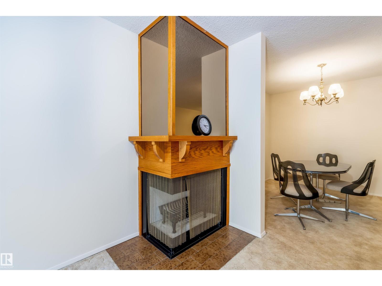 108 Forest Gv, St. Albert, AB - Indoor With Fireplace