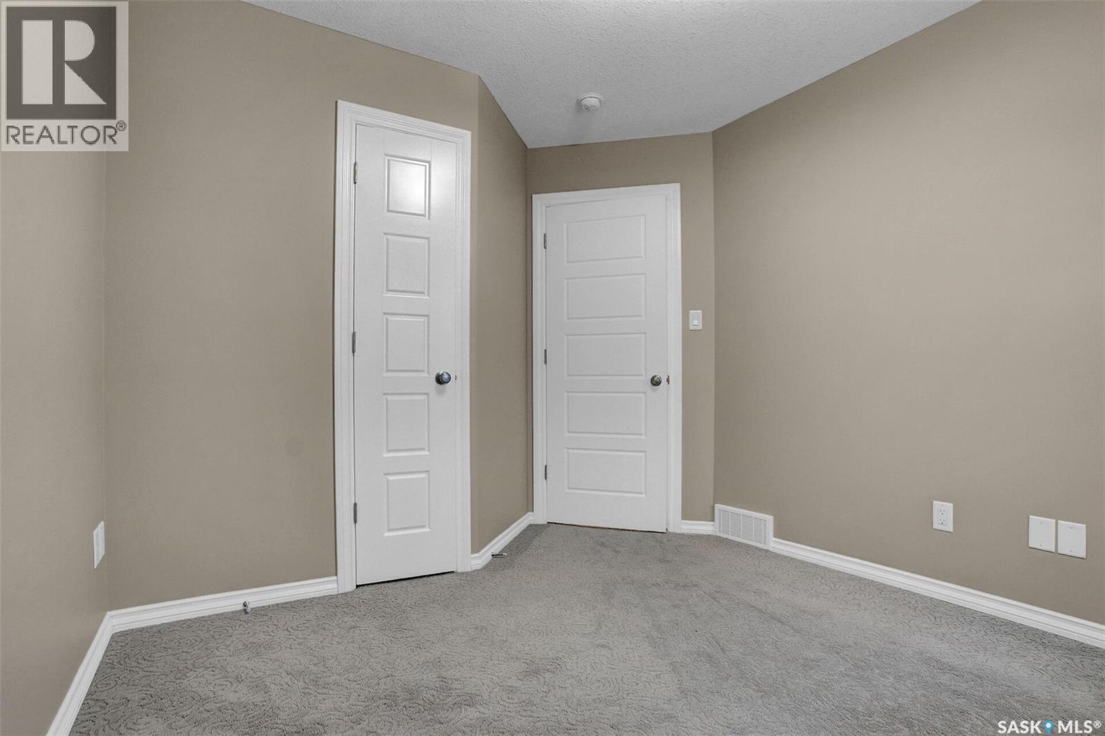 124 3229 Elgaard Drive, Regina, SK - Indoor Photo Showing Other Room