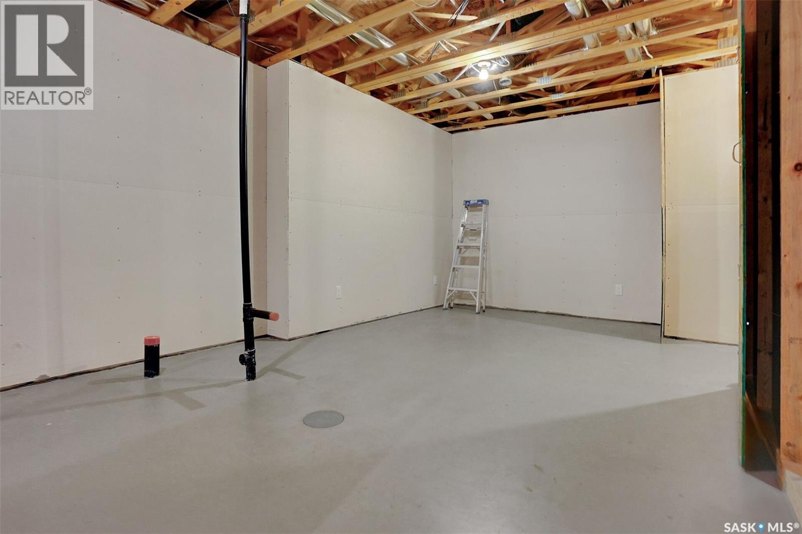 124 3229 Elgaard Drive, Regina, SK - Indoor Photo Showing Basement