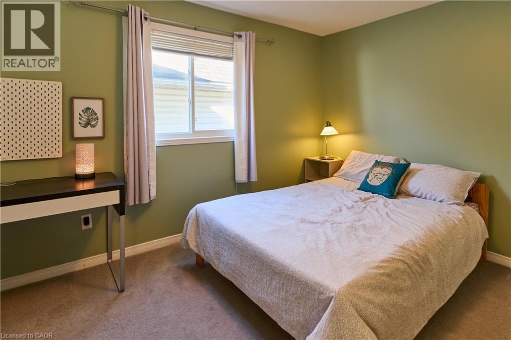 Carpeted bedroom featuring baseboards - 126 Snowdrop Crescent, Kitchener, ON - Indoor Photo Showing Bedroom