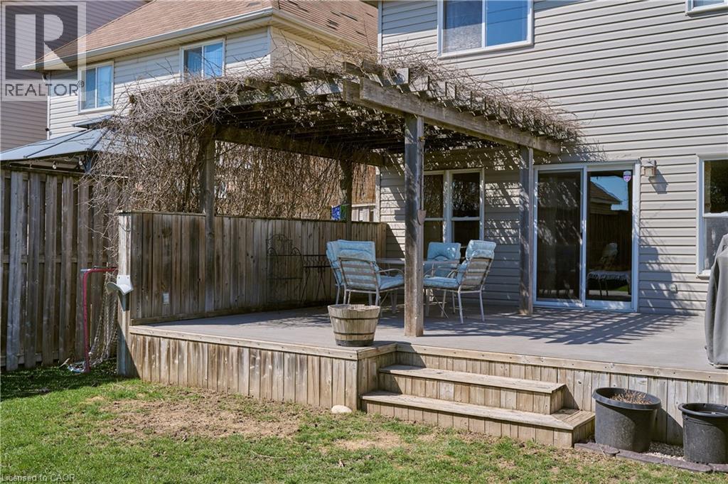 Wooden terrace with outdoor dining area - 126 Snowdrop Crescent, Kitchener, ON - Outdoor With Deck Patio Veranda