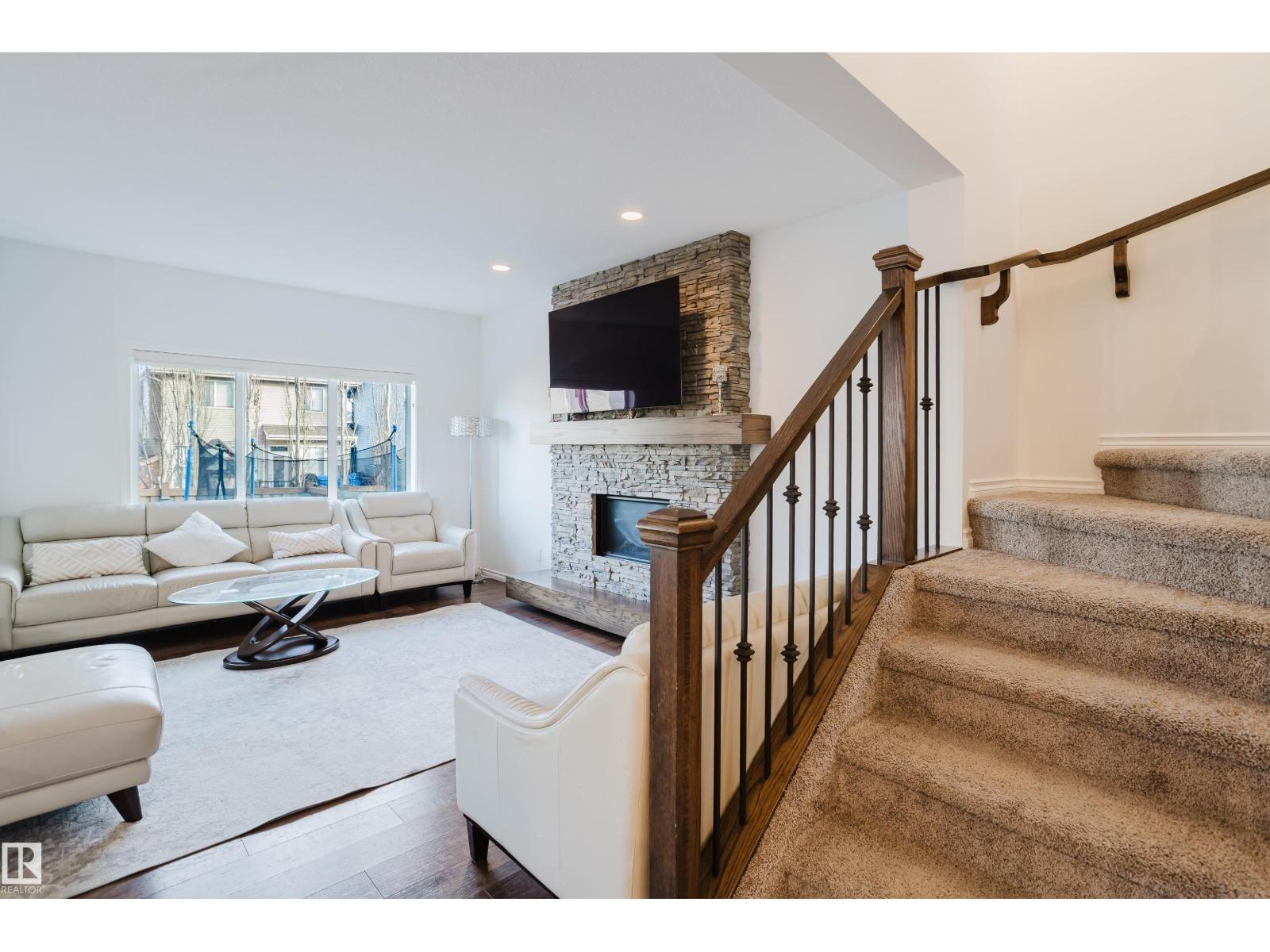 17539 61 St Nw, Edmonton, AB - Indoor Photo Showing Living Room With Fireplace
