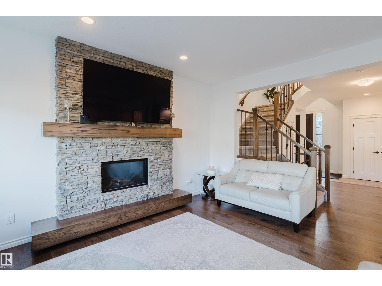 17539 61 St Nw, Edmonton, AB - Indoor Photo Showing Living Room With Fireplace