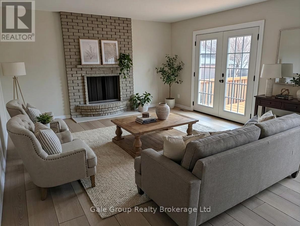 virtually staged family room - 165 Brookside Crescent, Kitchener, ON - Indoor Photo Showing Living Room With Fireplace