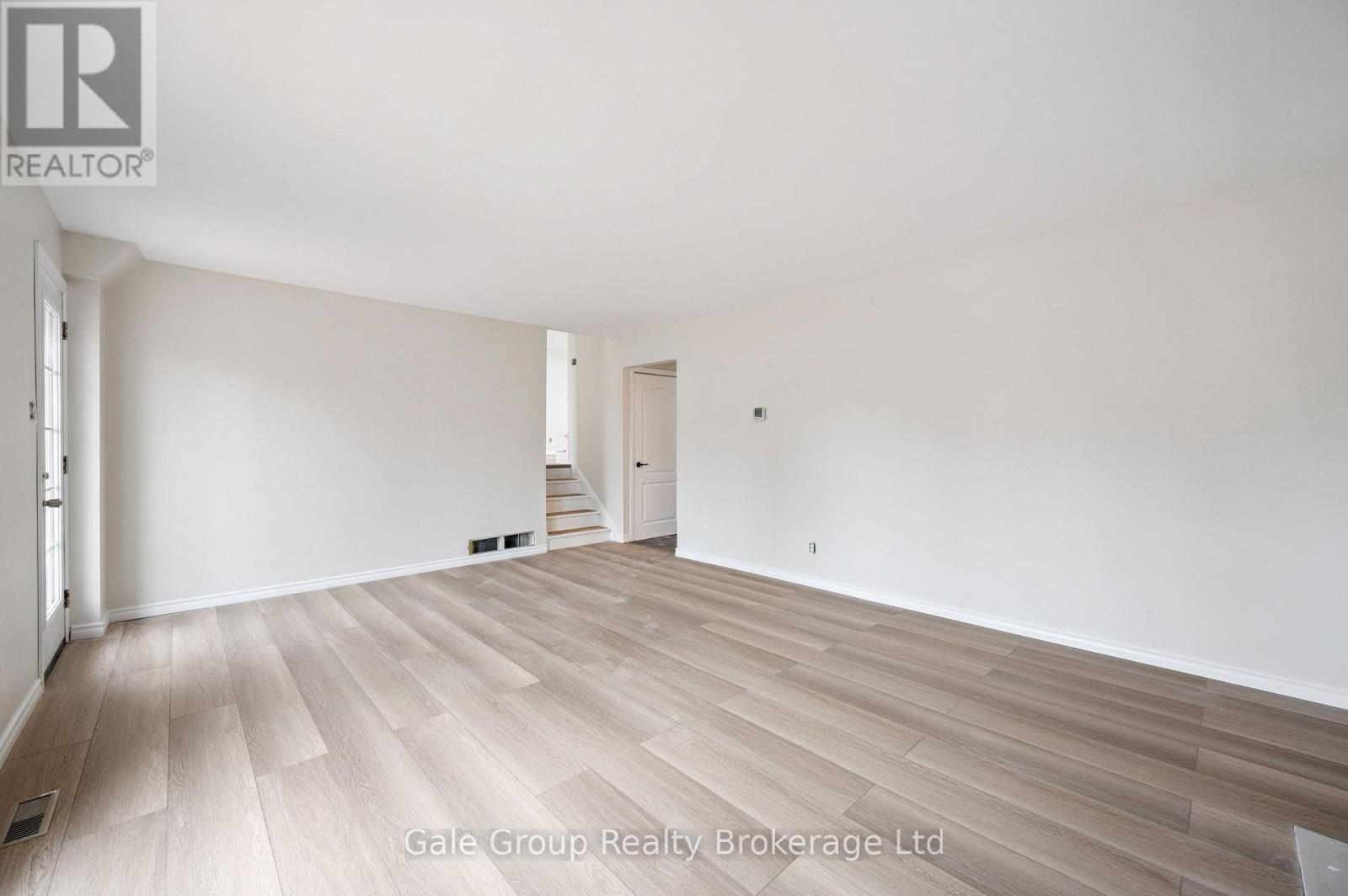 unfurnished family room - 165 Brookside Crescent, Kitchener, ON - Indoor Photo Showing Other Room