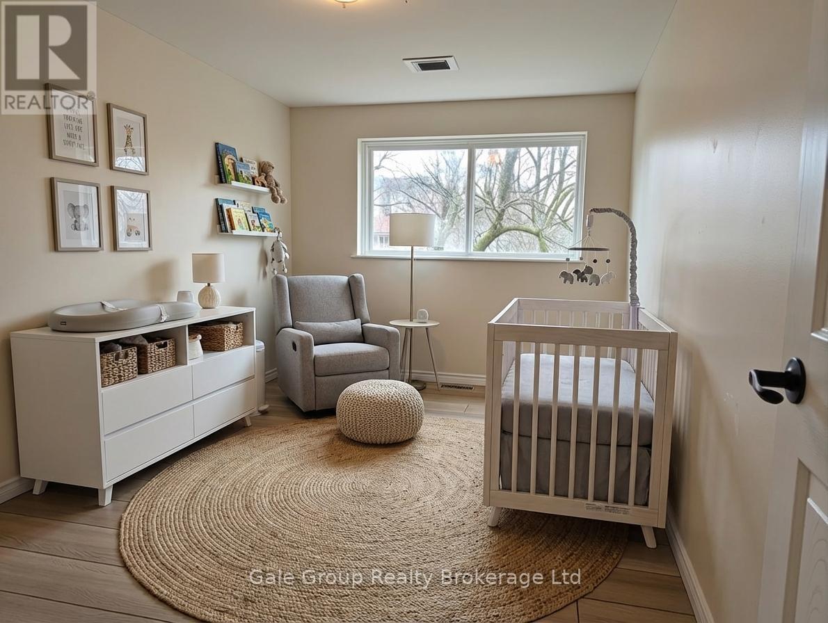 virtually staged third bedroom - 165 Brookside Crescent, Kitchener, ON - Indoor Photo Showing Bedroom