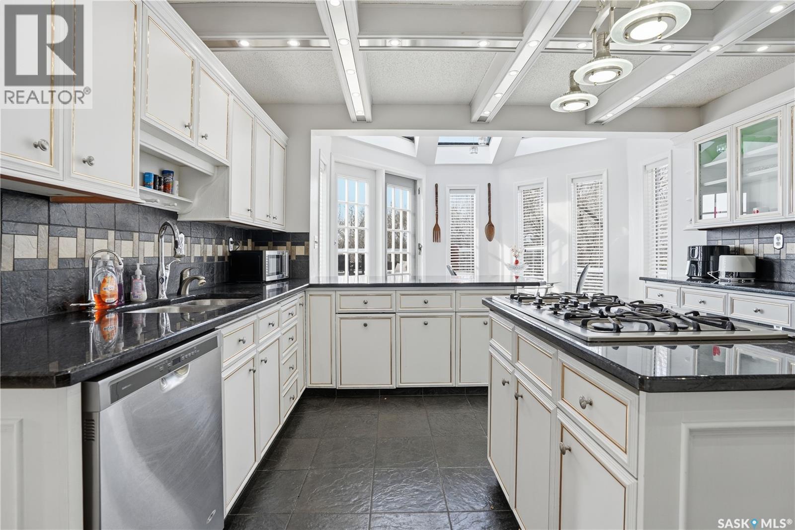 10 Meadow Bay, Lumsden, SK - Indoor Photo Showing Kitchen With Double Sink With Upgraded Kitchen