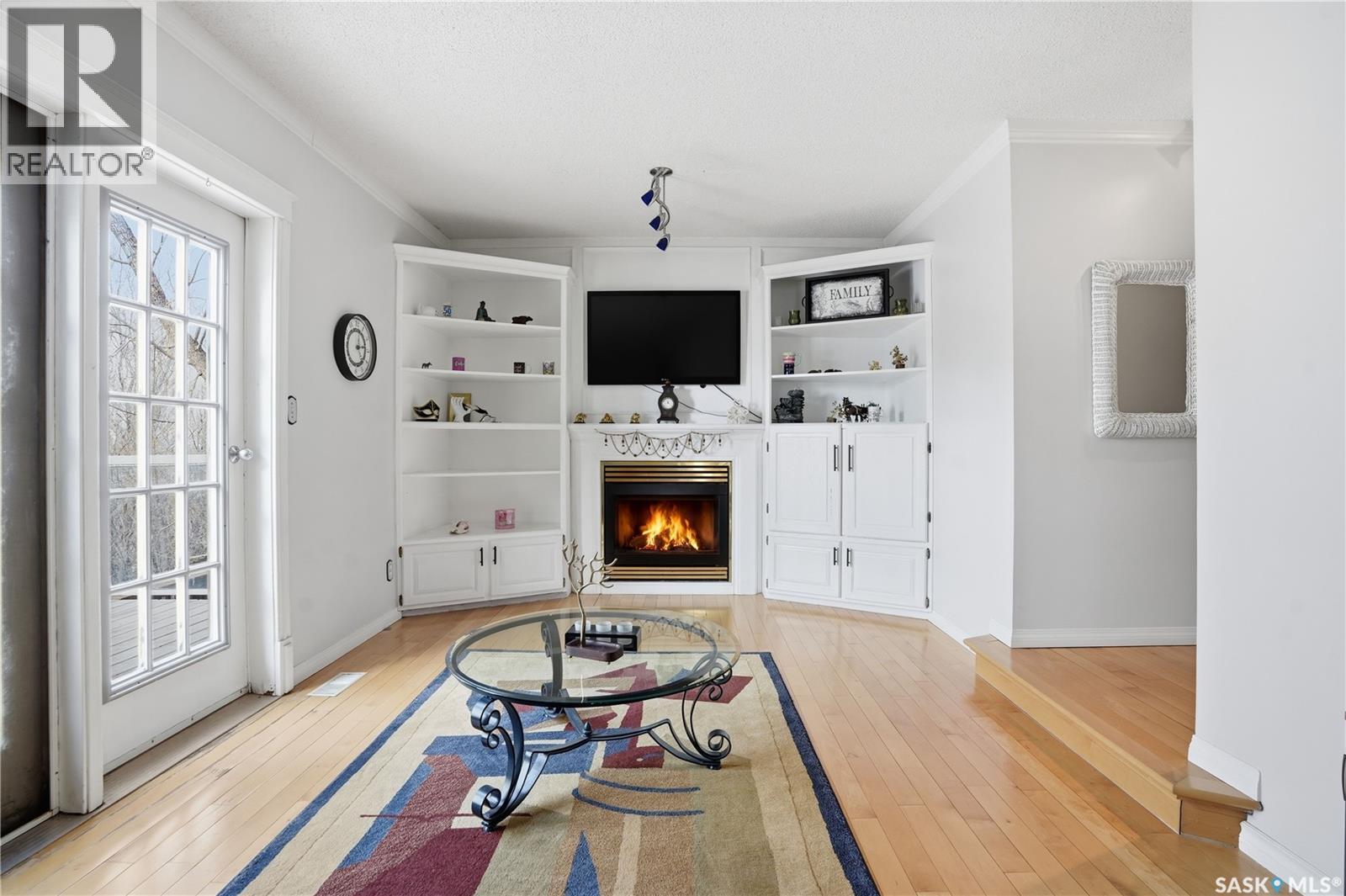 10 Meadow Bay, Lumsden, SK - Indoor With Fireplace