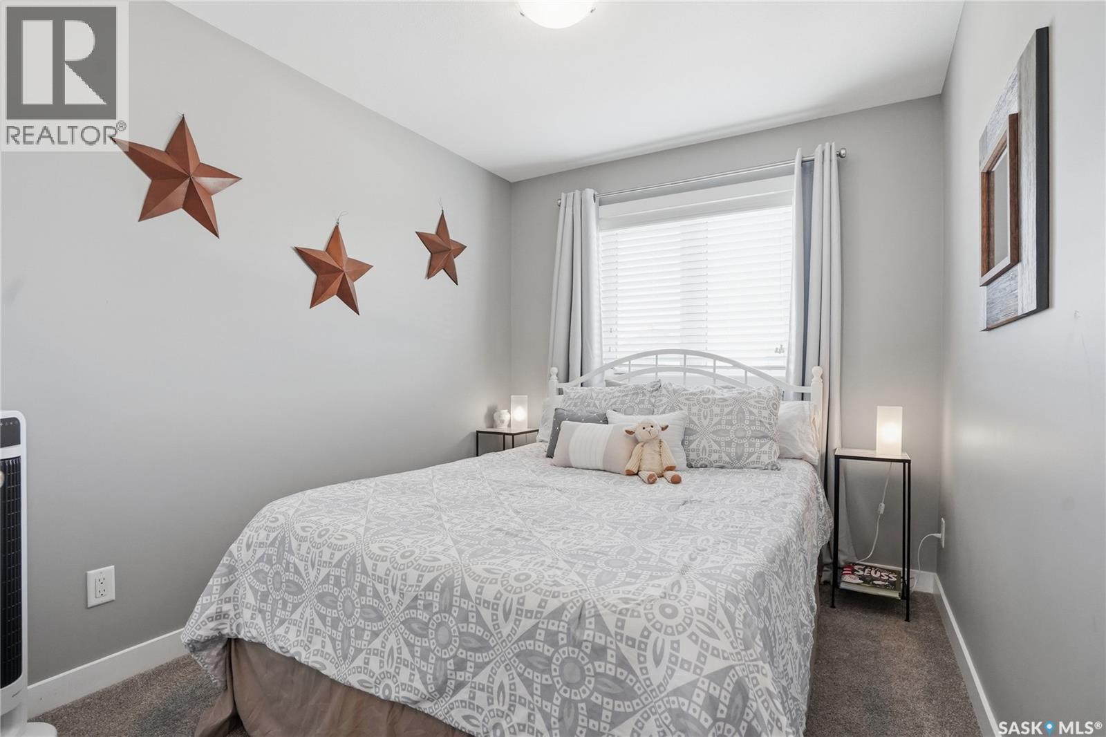 527 Maple Crescent, Warman, SK - Indoor Photo Showing Bedroom