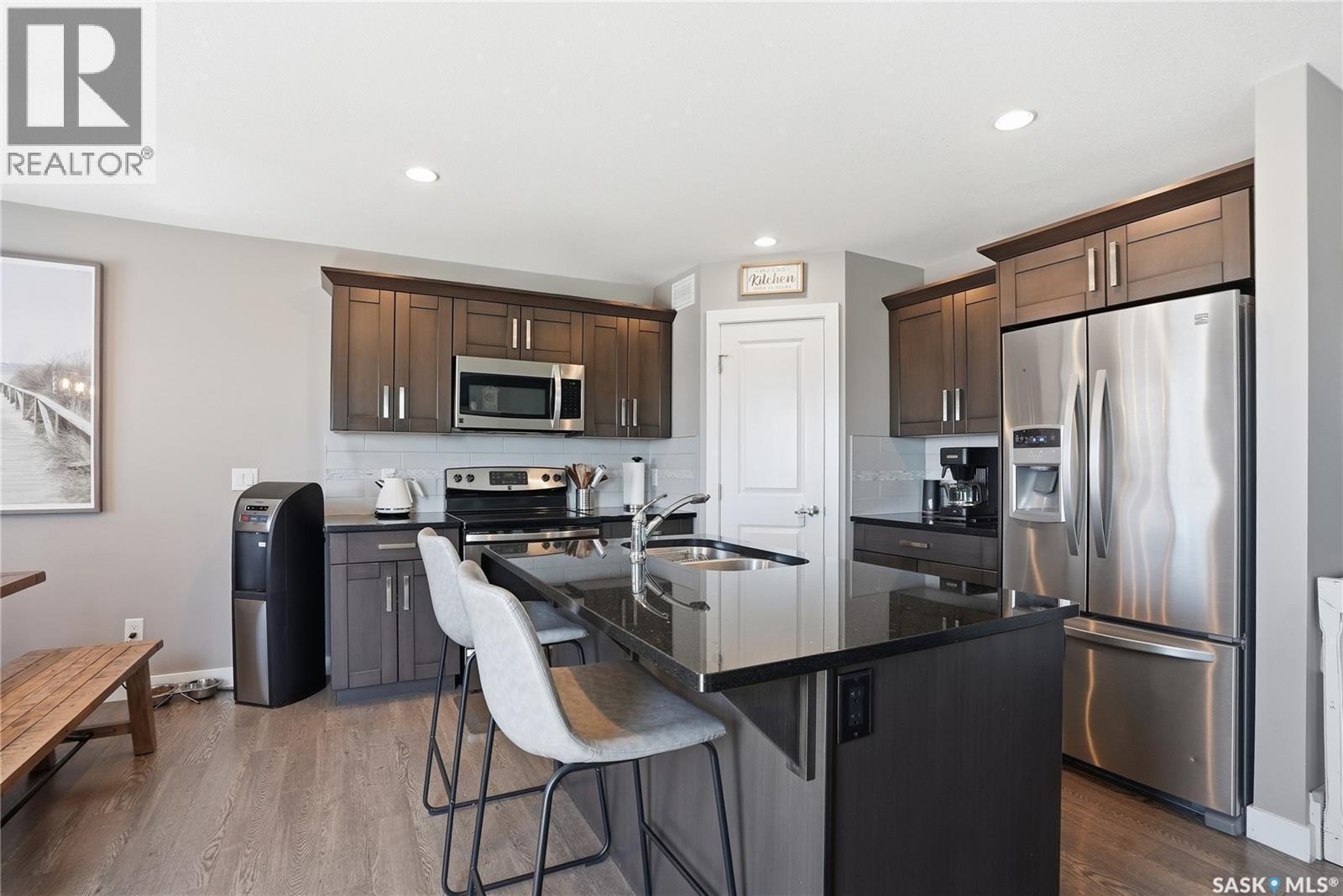 527 Maple Crescent, Warman, SK - Indoor Photo Showing Kitchen With Double Sink