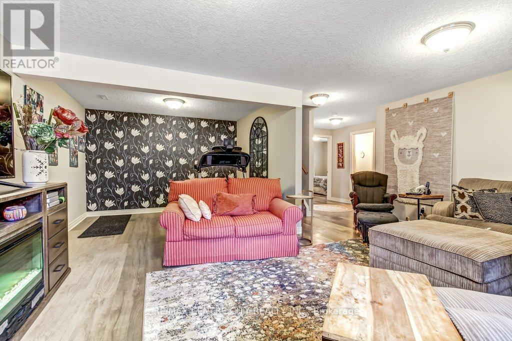 67 Peach Tree Boulevard, St. Thomas, ON - Indoor Photo Showing Living Room With Fireplace