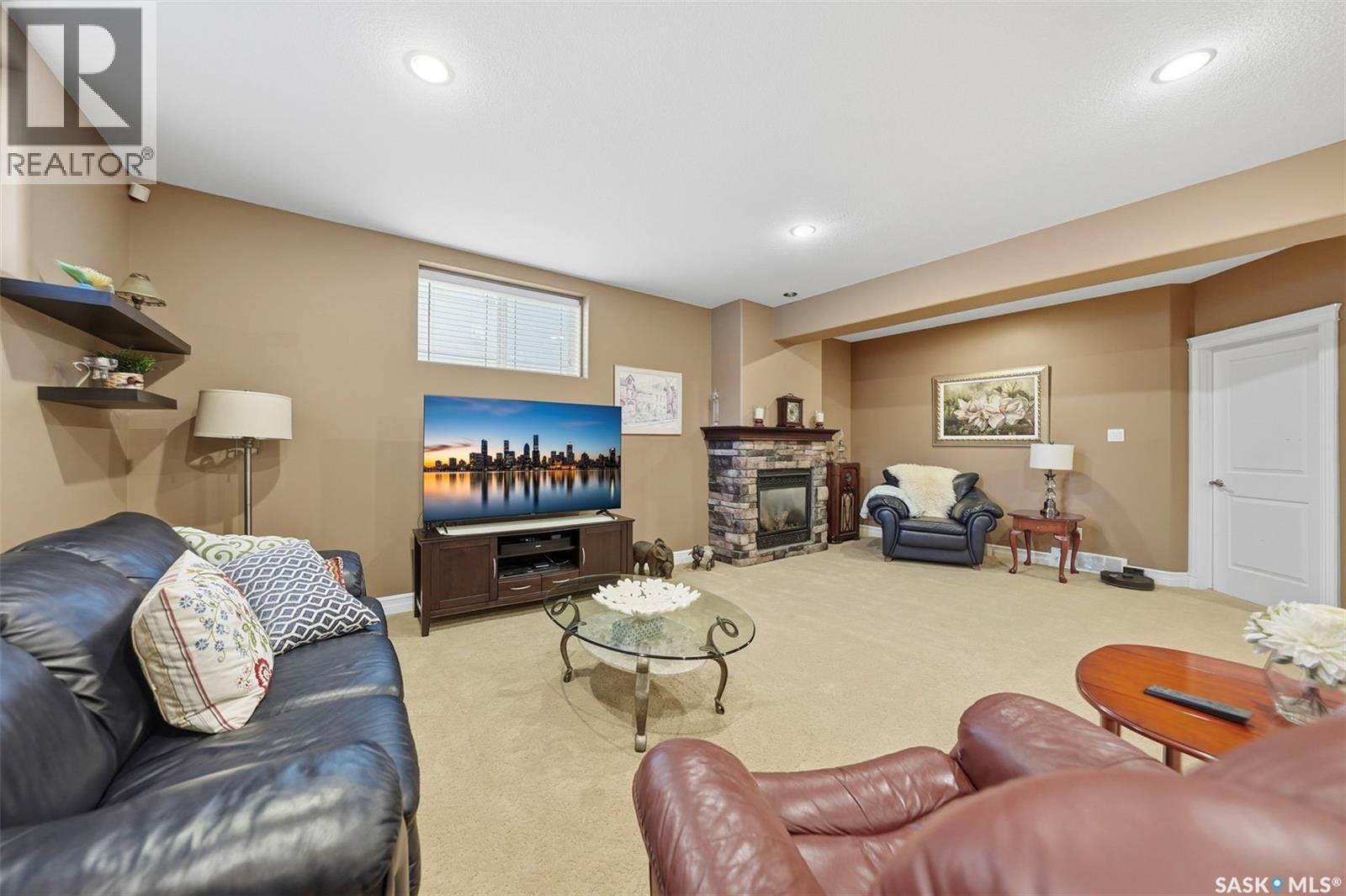 1202 Beechmont View, Saskatoon, SK - Indoor With Fireplace