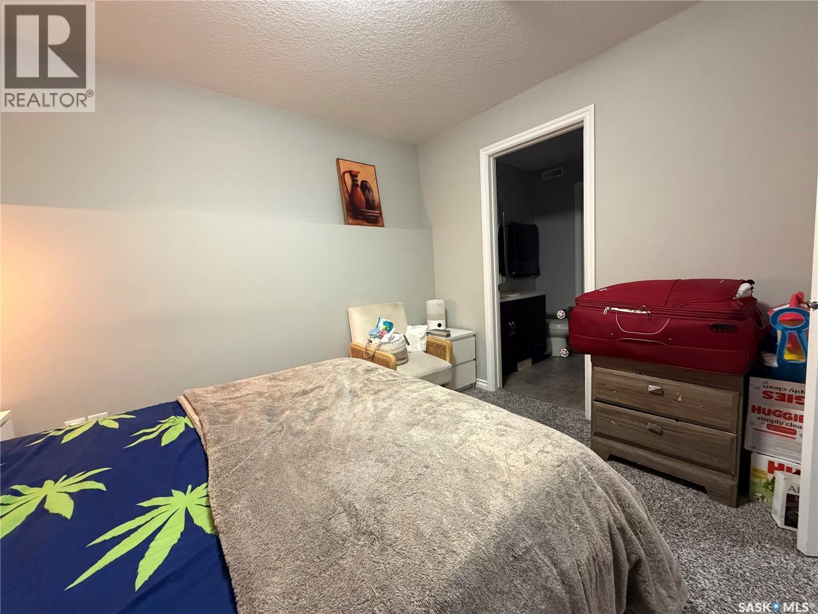 201 110 Akhtar Bend, Saskatoon, SK - Indoor Photo Showing Bedroom