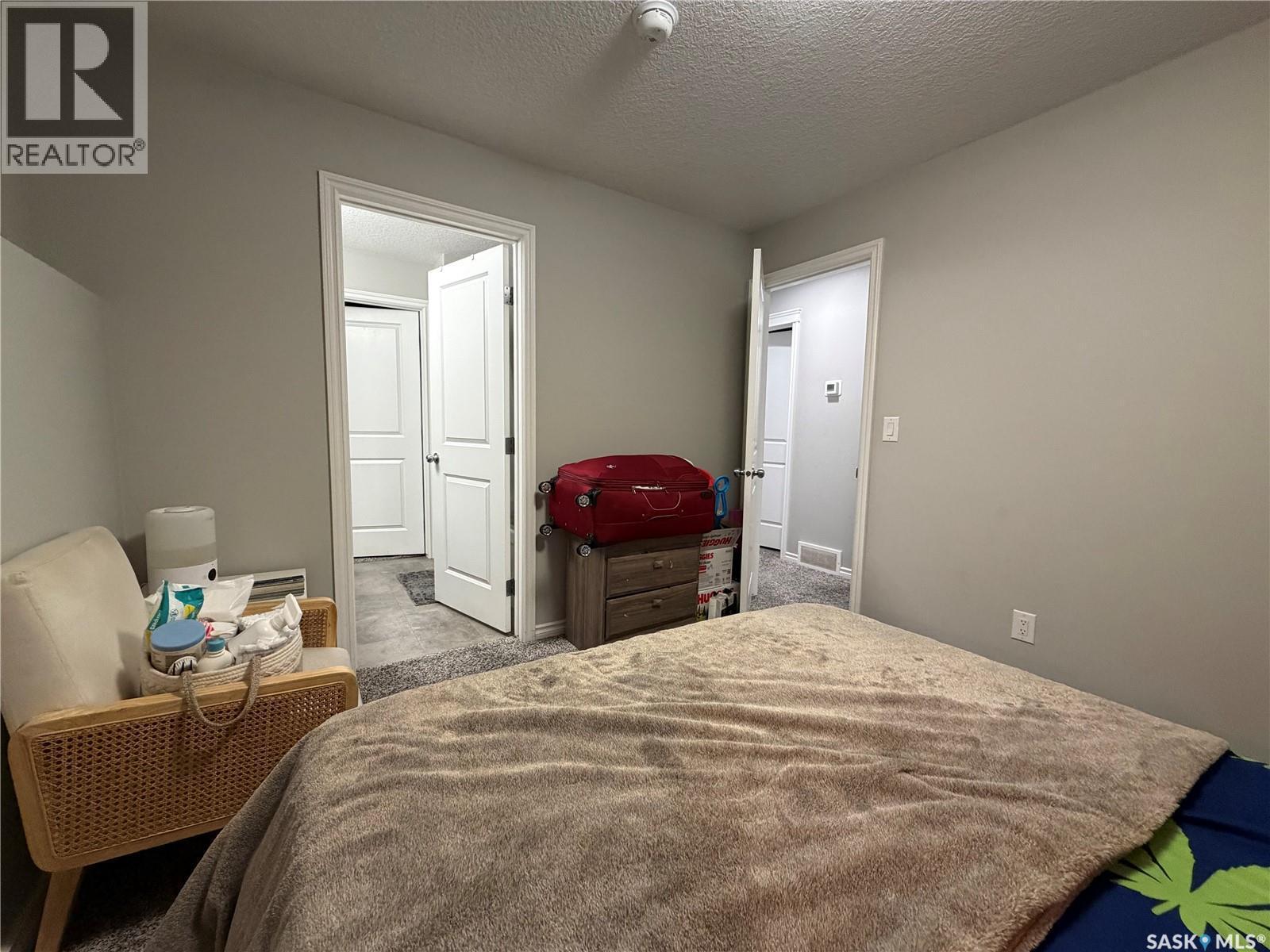 201 110 Akhtar Bend, Saskatoon, SK - Indoor Photo Showing Bedroom