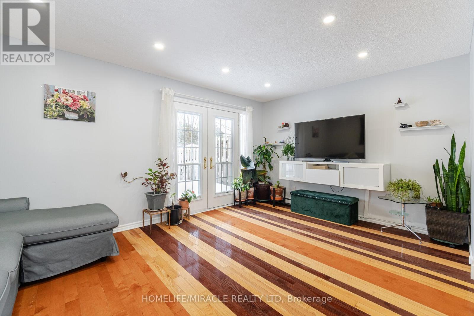 12 Huckleberry Square, Brampton, ON - Indoor Photo Showing Living Room With Fireplace