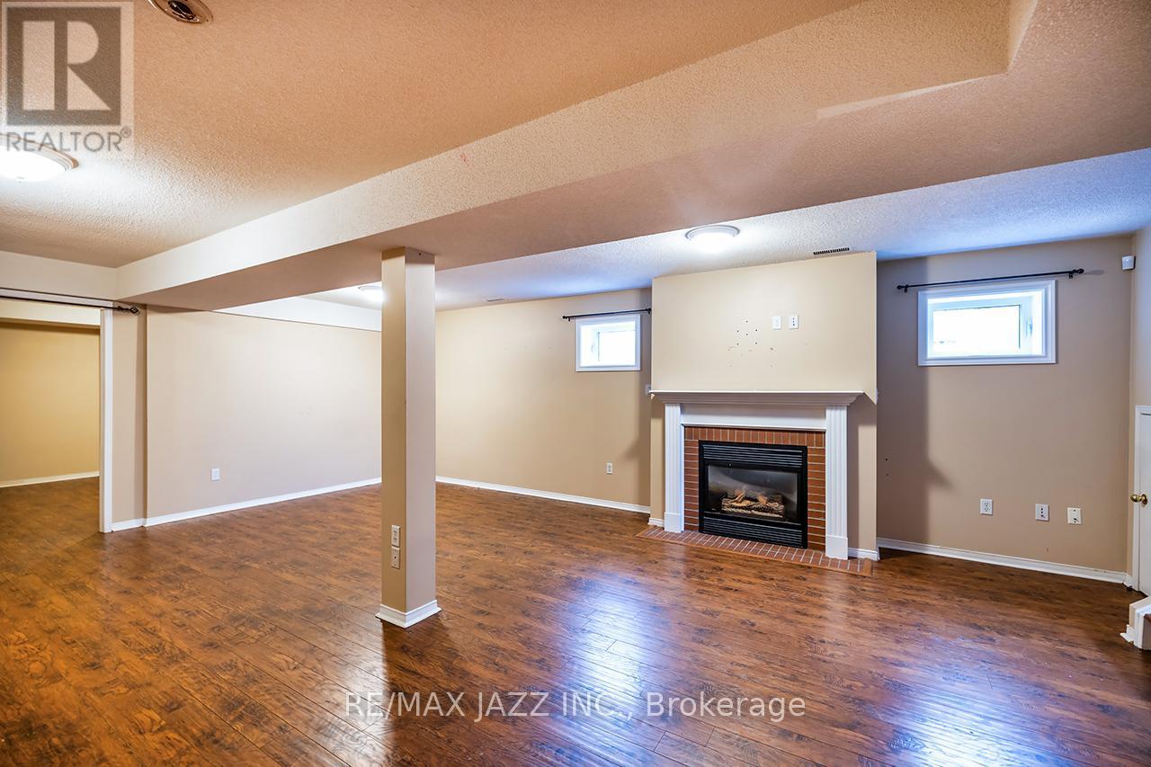 16 Goodwin Avenue, Clarington (Bowmanville), ON - Indoor Photo Showing Basement With Fireplace