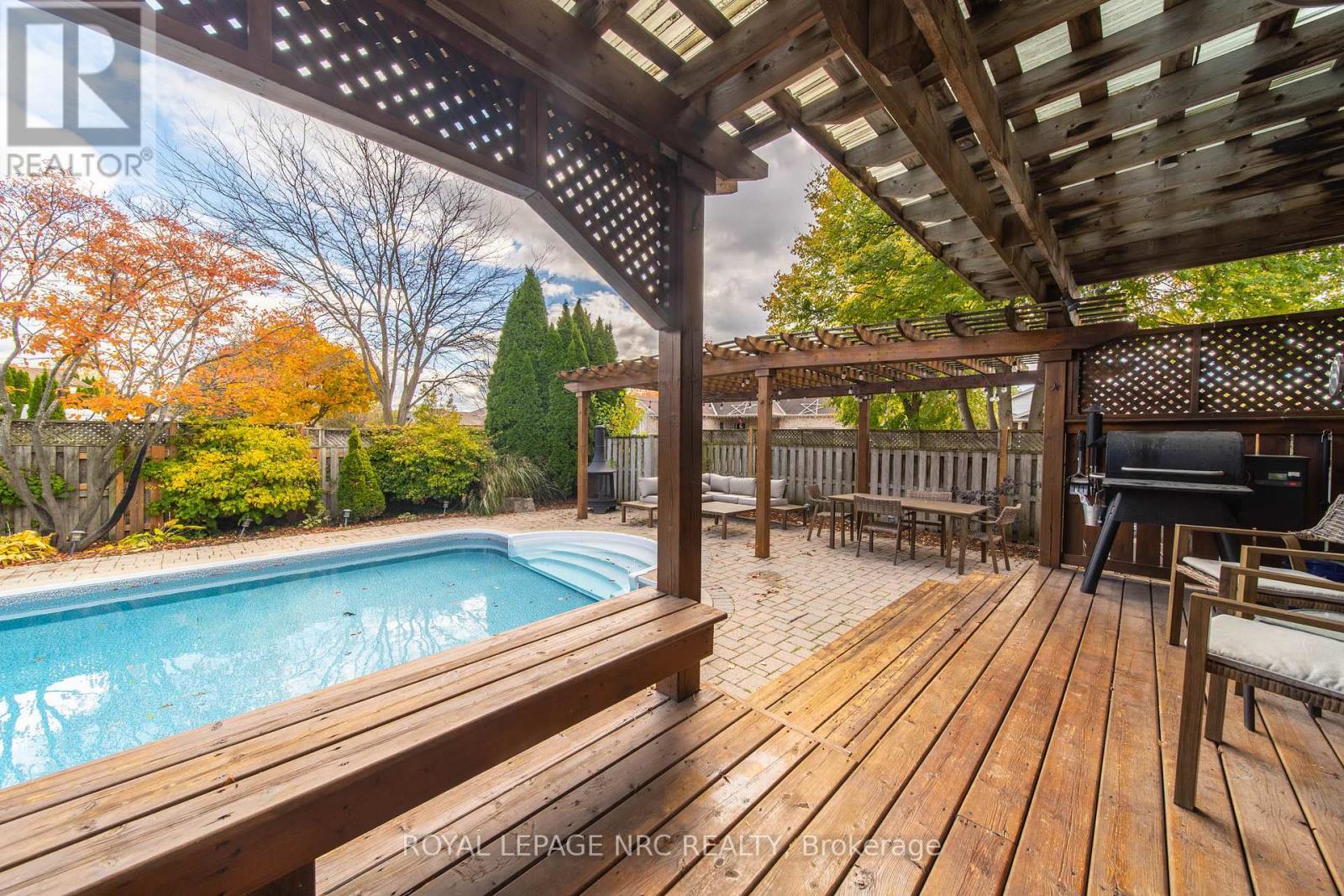 7955 Harvest Crescent, Niagara Falls (Ascot), ON - Outdoor With In Ground Pool With Deck Patio Veranda