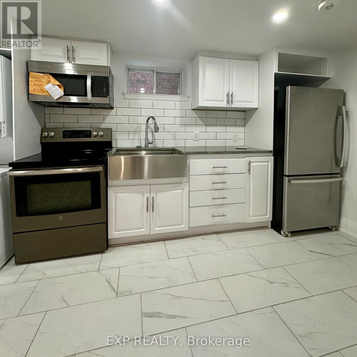 6 Lapp Street, Toronto (Rockcliffe-Smythe), ON - Indoor Photo Showing Kitchen With Double Sink