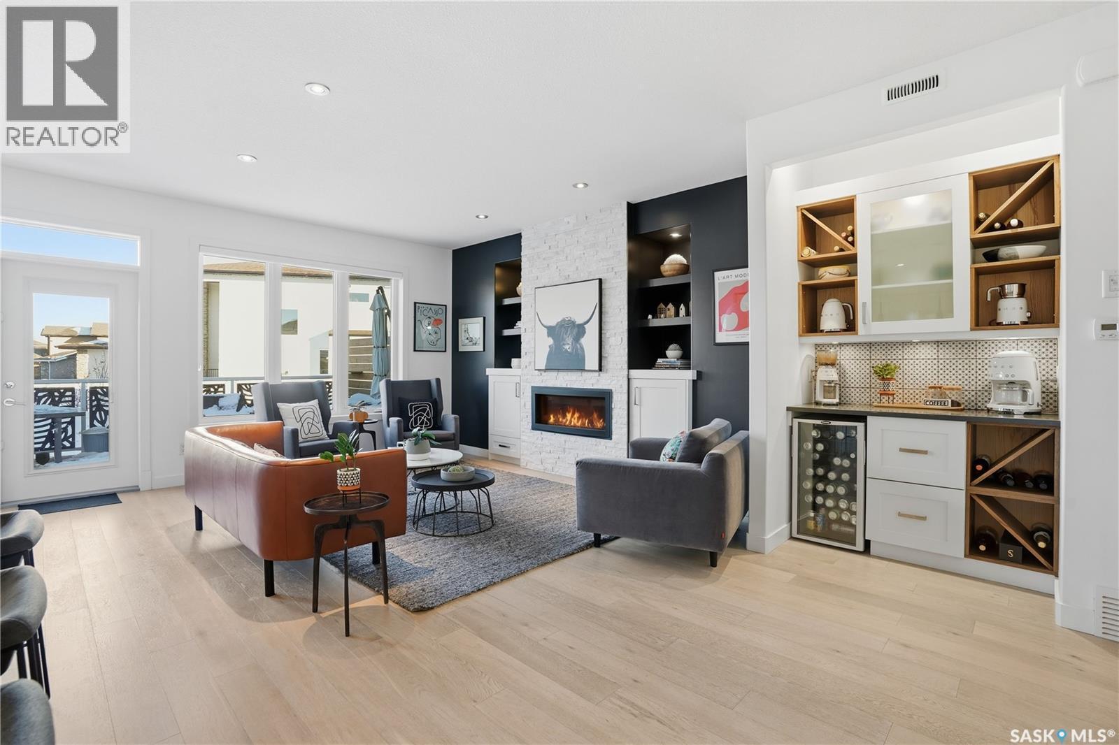 5322 Tutor Way, Regina, SK - Indoor Photo Showing Living Room With Fireplace