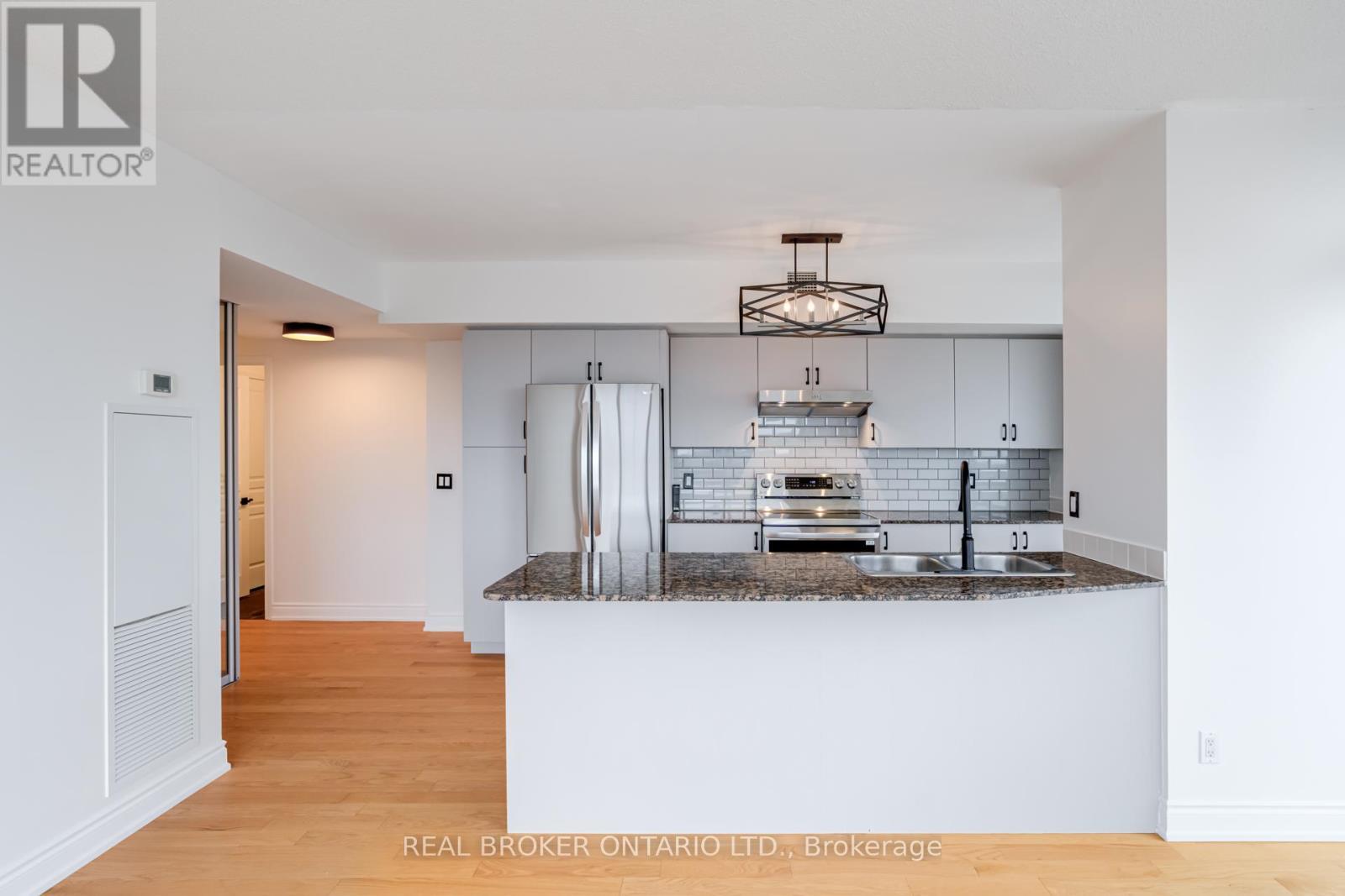 702 - 2240 Lakeshore Boulevard W, Toronto, ON - Indoor Photo Showing Kitchen With Double Sink