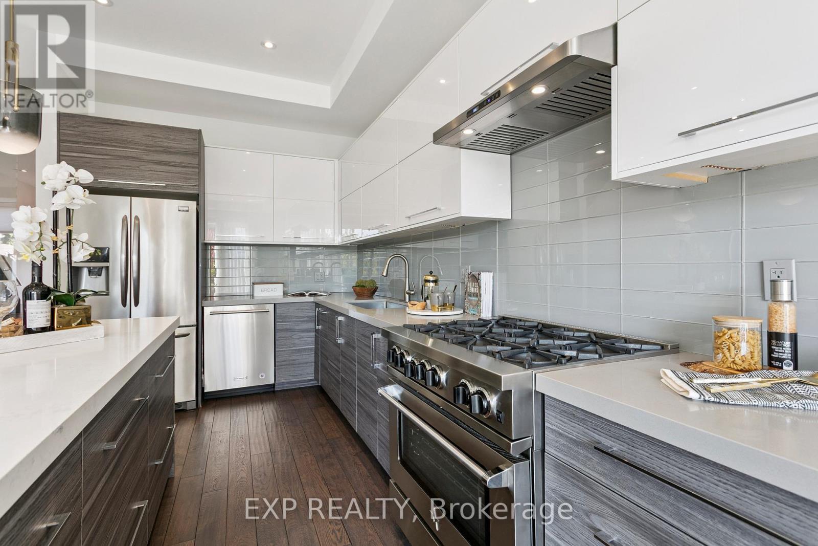 105 Twenty Second Street, Toronto, ON - Indoor Photo Showing Kitchen With Stainless Steel Kitchen With Upgraded Kitchen