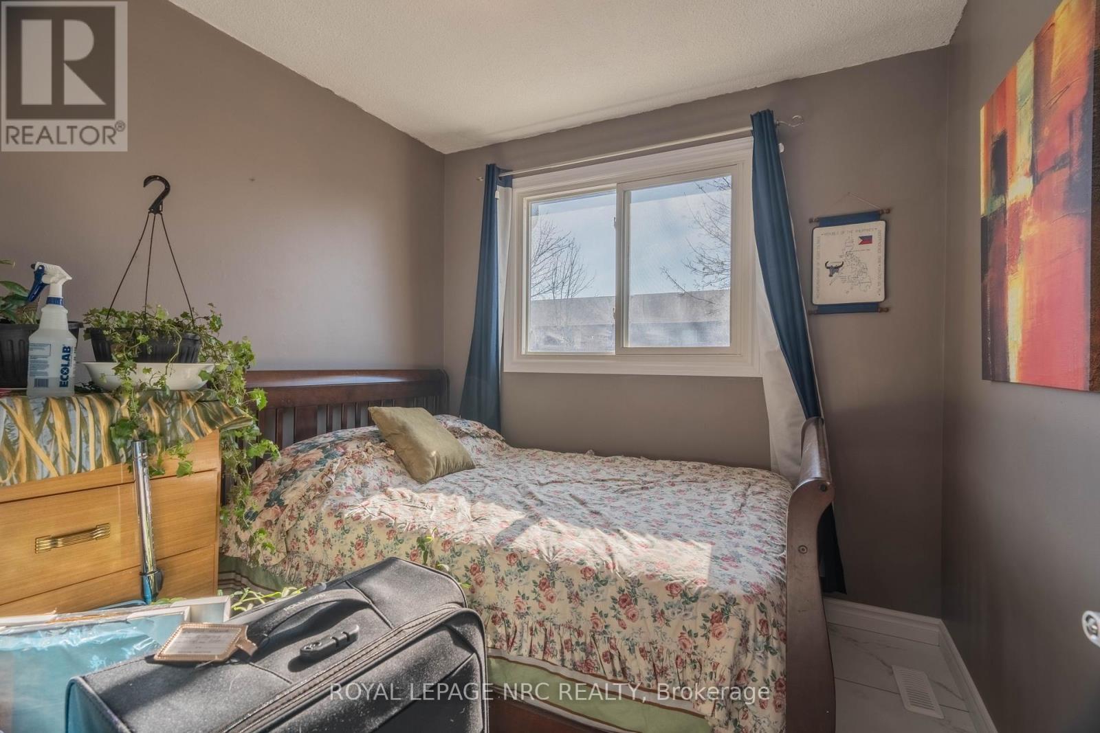 Bedroom 1 Upstairs - 38 Dougherty Crescent, Welland (N. Welland), ON - Indoor Photo Showing Bedroom
