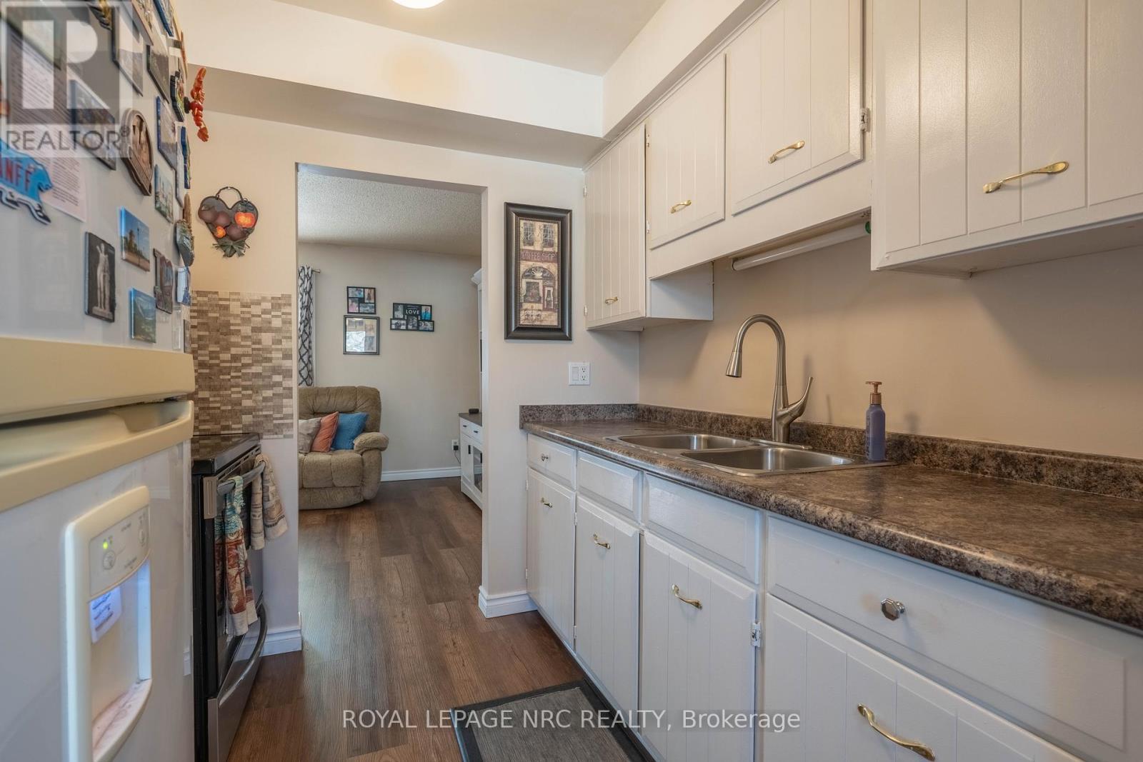 Galley Kitchen - 38 Dougherty Crescent, Welland (N. Welland), ON - Indoor Photo Showing Kitchen With Double Sink