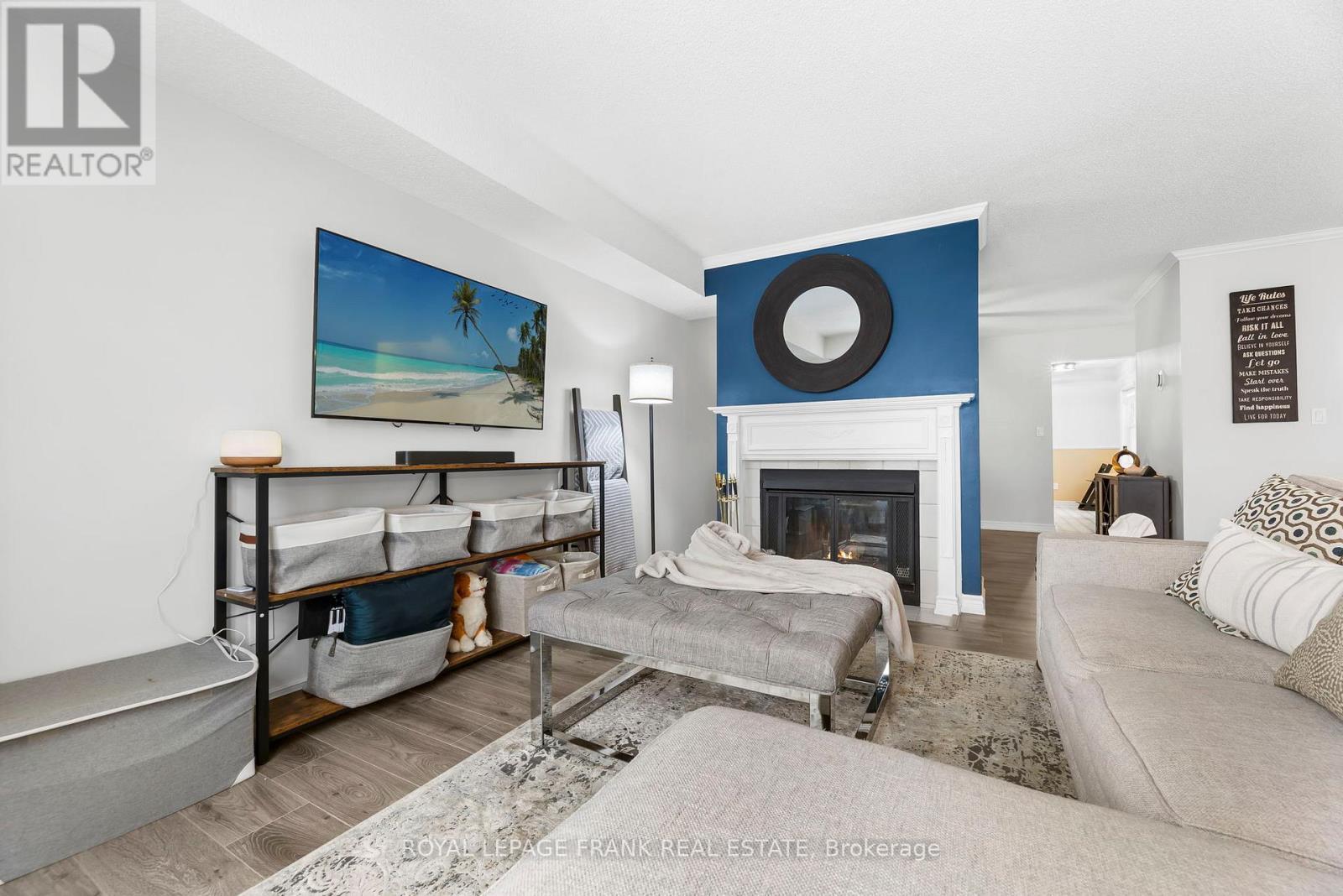 E12 - 1665 Nash Road, Clarington (Courtice), ON - Indoor Photo Showing Other Room With Fireplace