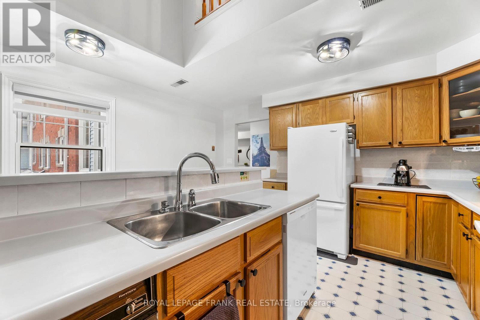 E12 - 1665 Nash Road, Clarington (Courtice), ON - Indoor Photo Showing Kitchen With Double Sink