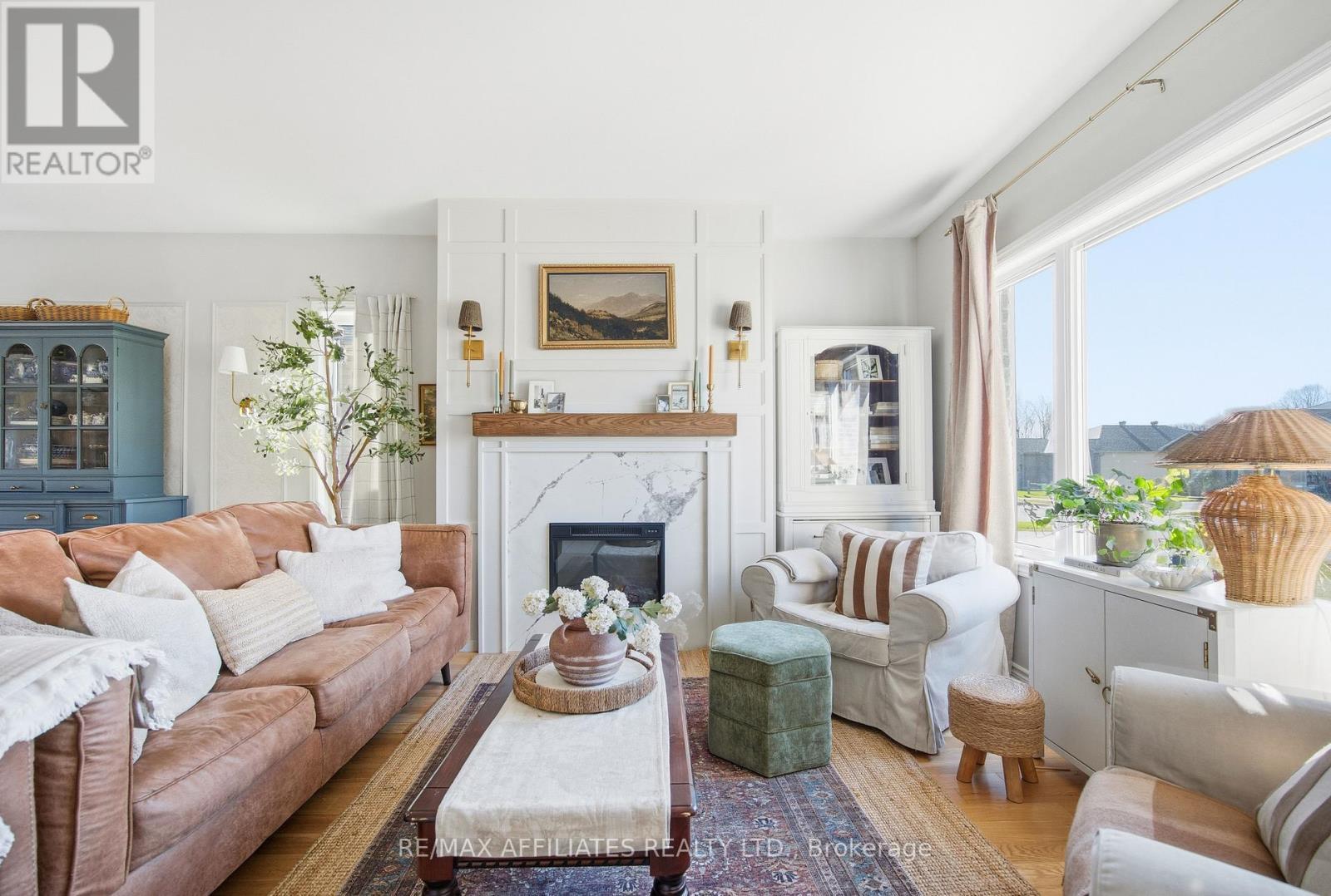 19 Senators Gate Drive, Perth, ON - Indoor Photo Showing Living Room With Fireplace