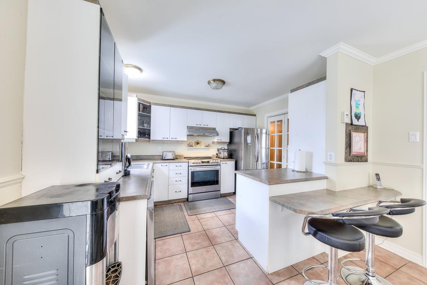 Kitchen - 20500 Rue Des Sports, Mirabel, QC - Indoor Photo Showing Kitchen