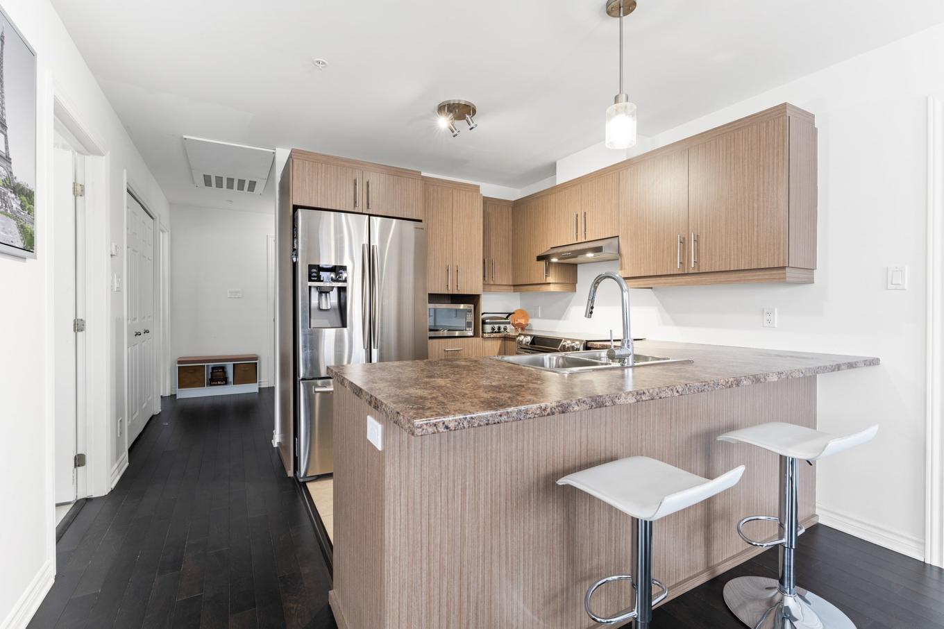 Overall view - 301-121 Rue François-Souillard, Laval (Laval-Des-Rapides), QC - Indoor Photo Showing Kitchen With Double Sink