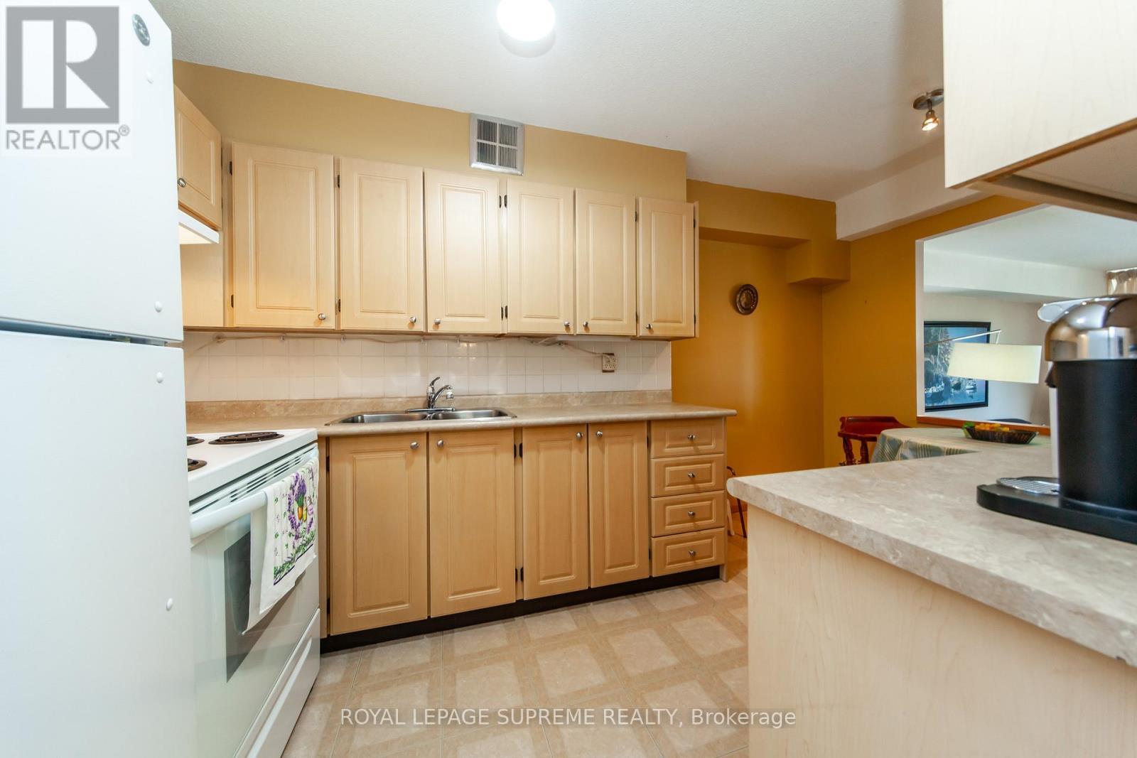 205 - 270 Scarlett Road, Toronto, ON - Indoor Photo Showing Kitchen With Double Sink