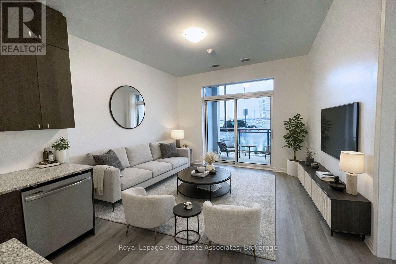 Digitally Staged - 108 - 460 Gordon Krantz Avenue, Milton, ON - Indoor Photo Showing Living Room