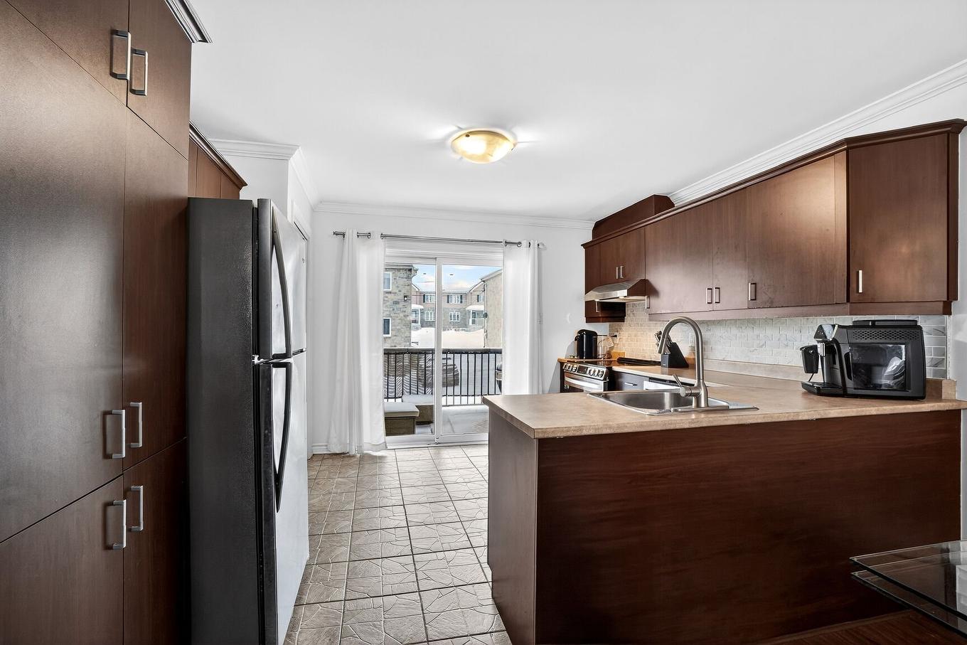 Kitchen - 103 Rue Deschambault, Saint-Jérôme, QC - Indoor Photo Showing Kitchen With Double Sink
