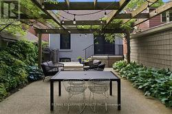 Exposed aggregate and green space -