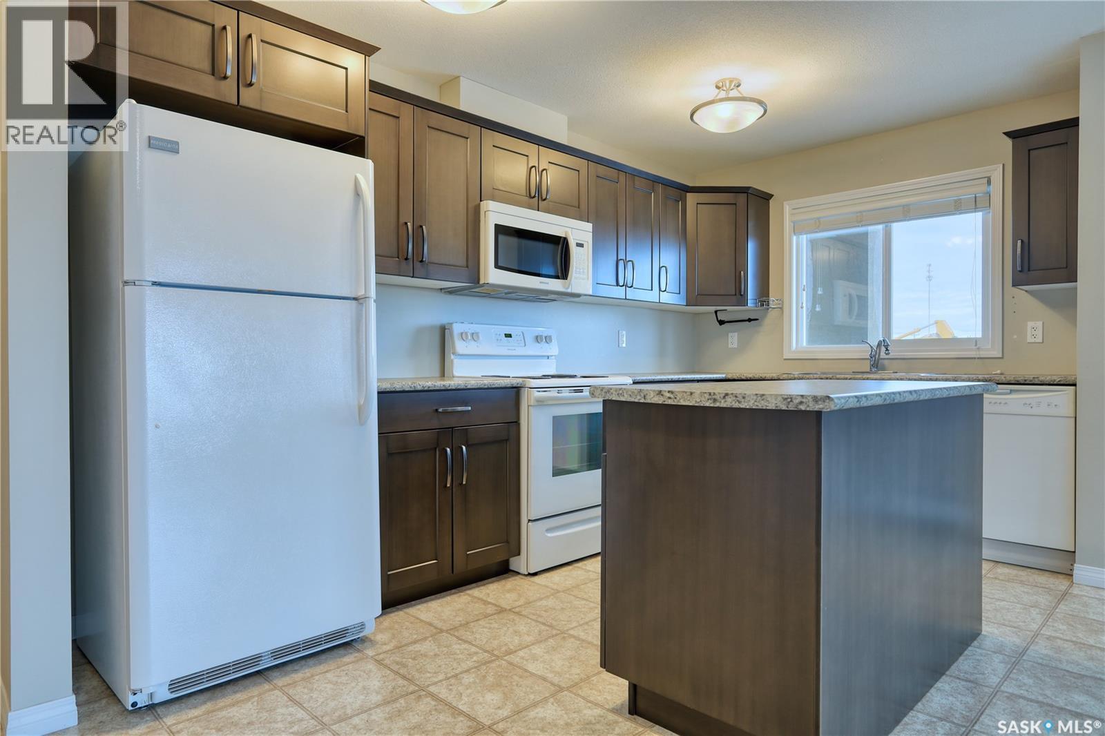 112 610 Centennial Boulevard, Warman, SK - Indoor Photo Showing Kitchen