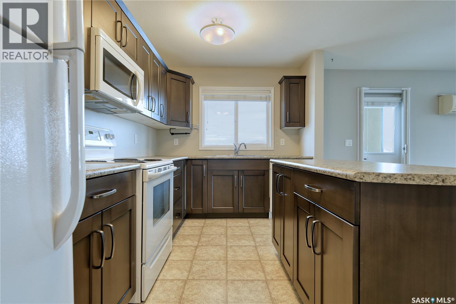 112 610 Centennial Boulevard, Warman, SK - Indoor Photo Showing Kitchen