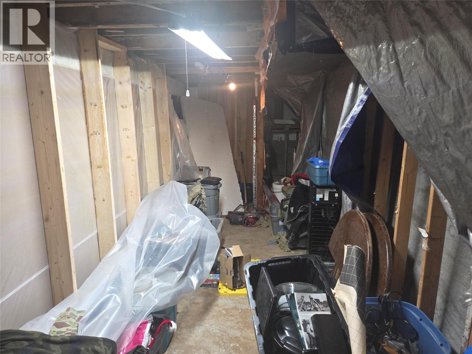 Third house - 1381 3B Highway, Warfield, BC - Indoor Photo Showing Basement