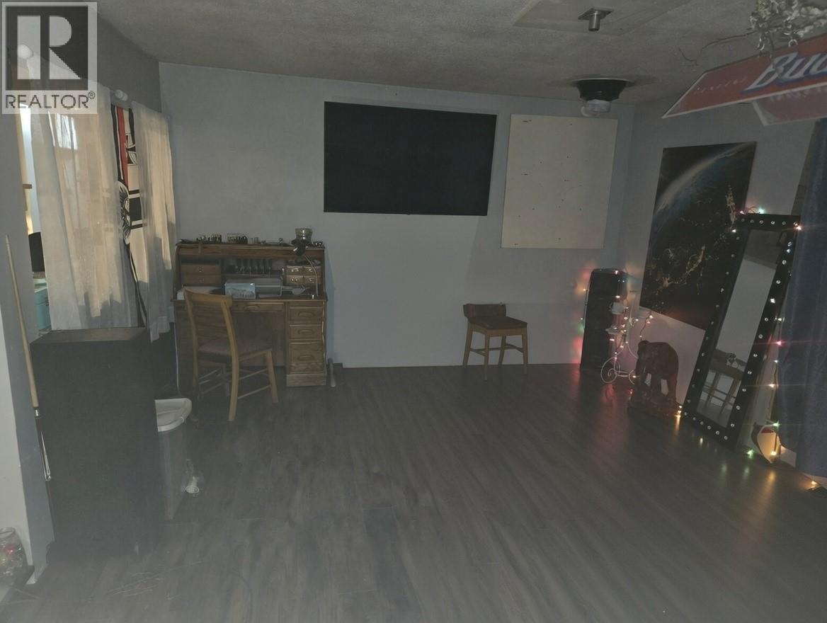 Second House - 1381 3B Highway, Warfield, BC - Indoor Photo Showing Other Room
